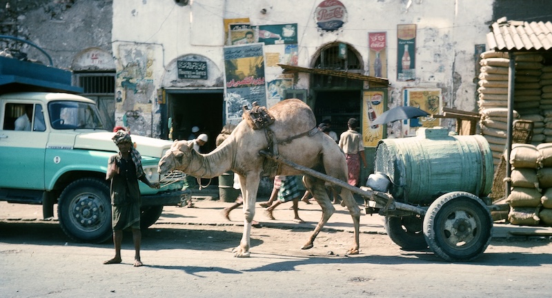 Street scene with watercart vendor in Aden, Yemen